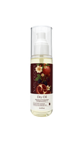 A 3.4 fl oz bottle of Natuology Dry Oil Blackberry Rhombeann Reminding Body Oil, featuring a clear cap, white pump, and a label with illustrations of berries and pomegranate on a white background.